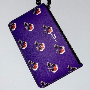 Purple floral Coach wristlet